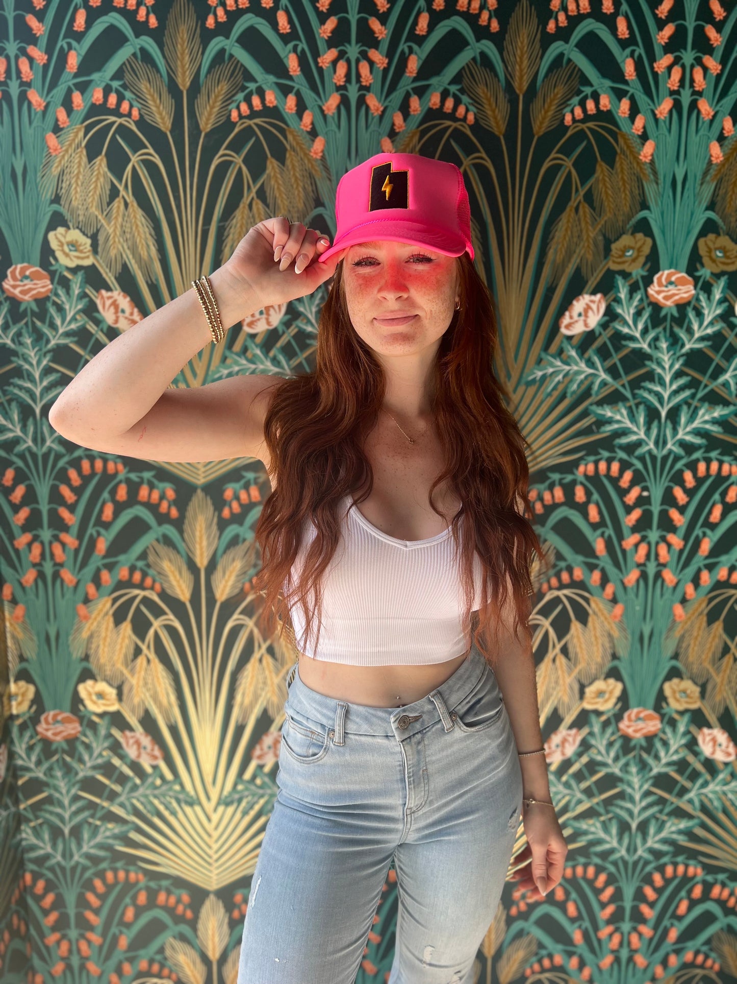 TMG Always Earned Trucker Hat in Limited-Edition Hot N' Pink